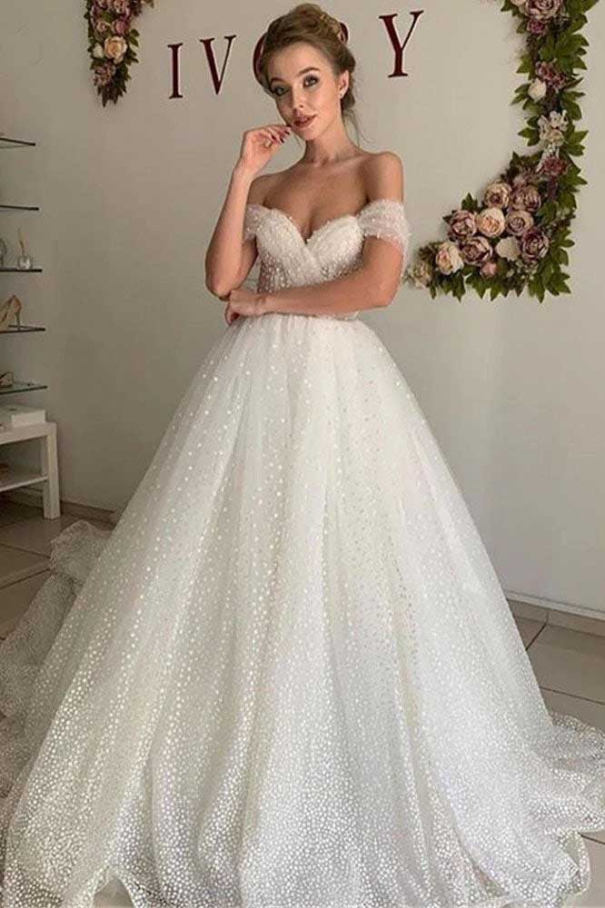 Glitter Tulle A Line Dotted Off the Shoulder Wedding Dresses, Wedding Gowns trendtydresses Glitter Tulle A Line Dotted Off the Shoulder Wedding Dresses, Wedding Gowns trendtydresses
